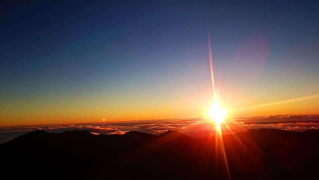 Haleakala,
Hawaiian Island of Maui
<br>
Sunrise overlooking Haleakala National Park